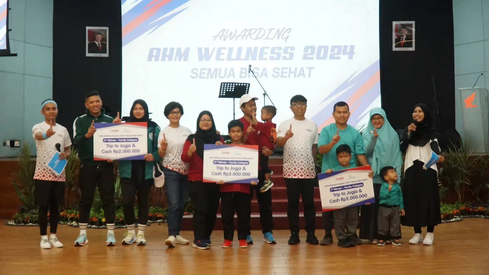 Participants and families at a corporate wellness awarding event