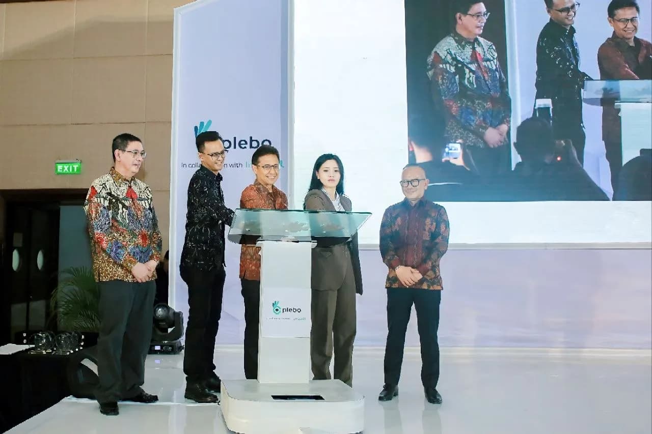 Kalayudha and partners at the launch of a health collaboration on stage