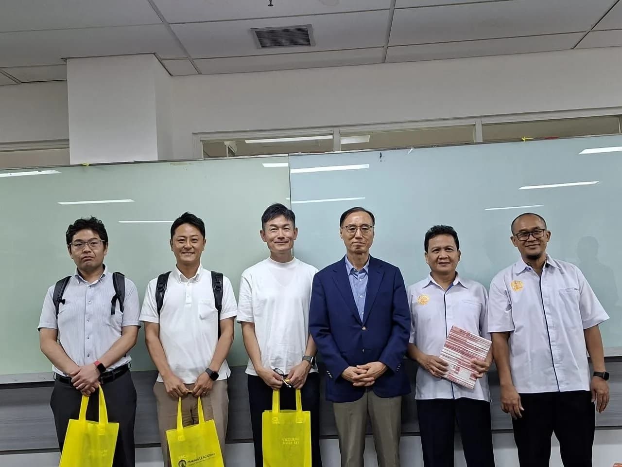 Kalayudha and Makara UI Academy representatives with partners after a collaboration meeting